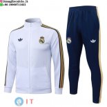 Giacca Full Zip e Pantaloni Allenamento Real Madrid 26-27 Bianco Giallo Blu Navy Giacca Full Zip e Pantaloni Allenamento Real Madrid 26-27 Bianco Giallo Blu Navy