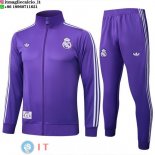 Giacca Lunga Zip Set Completo Real Madrid 25-26 I Purpureo Giacca Lunga Zip Set Completo Real Madrid 25-26 I Purpureo